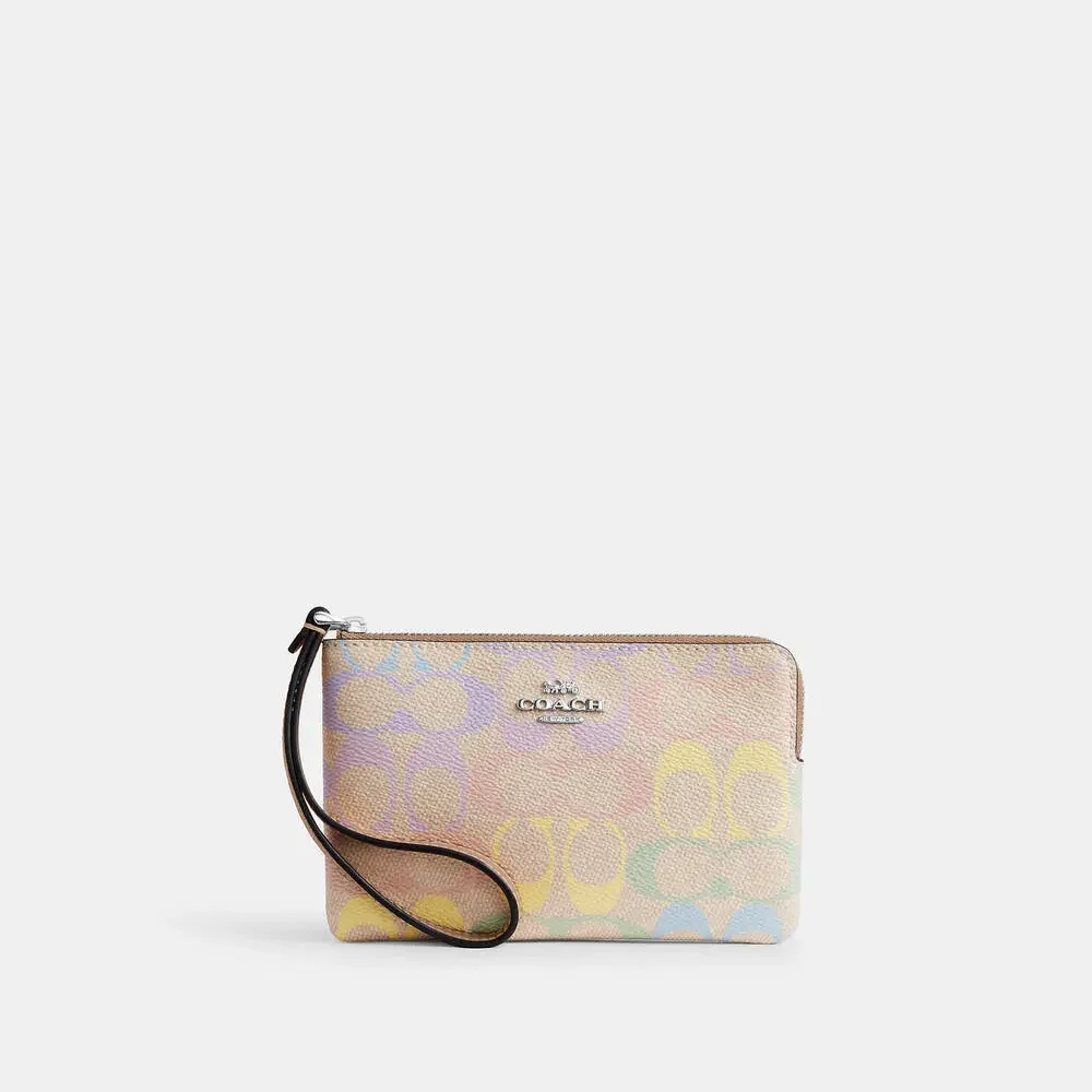 Coach Corner Zip Wristlet In Rainbow Signature Canvas